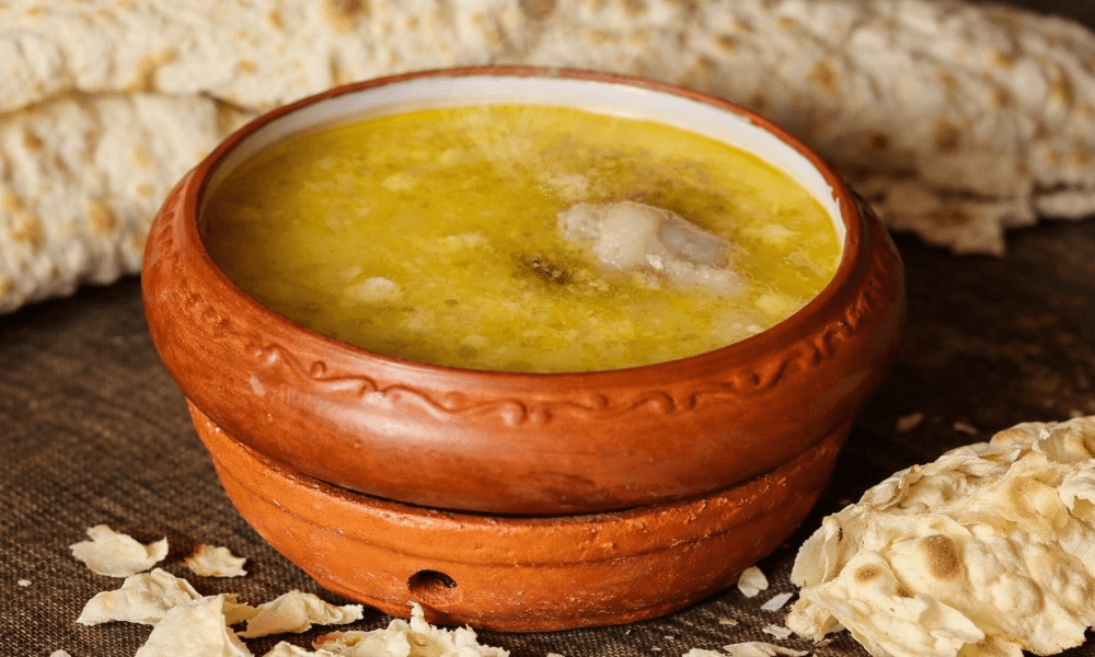 Armenian khash ritual in the early morning with friends gathered around the table